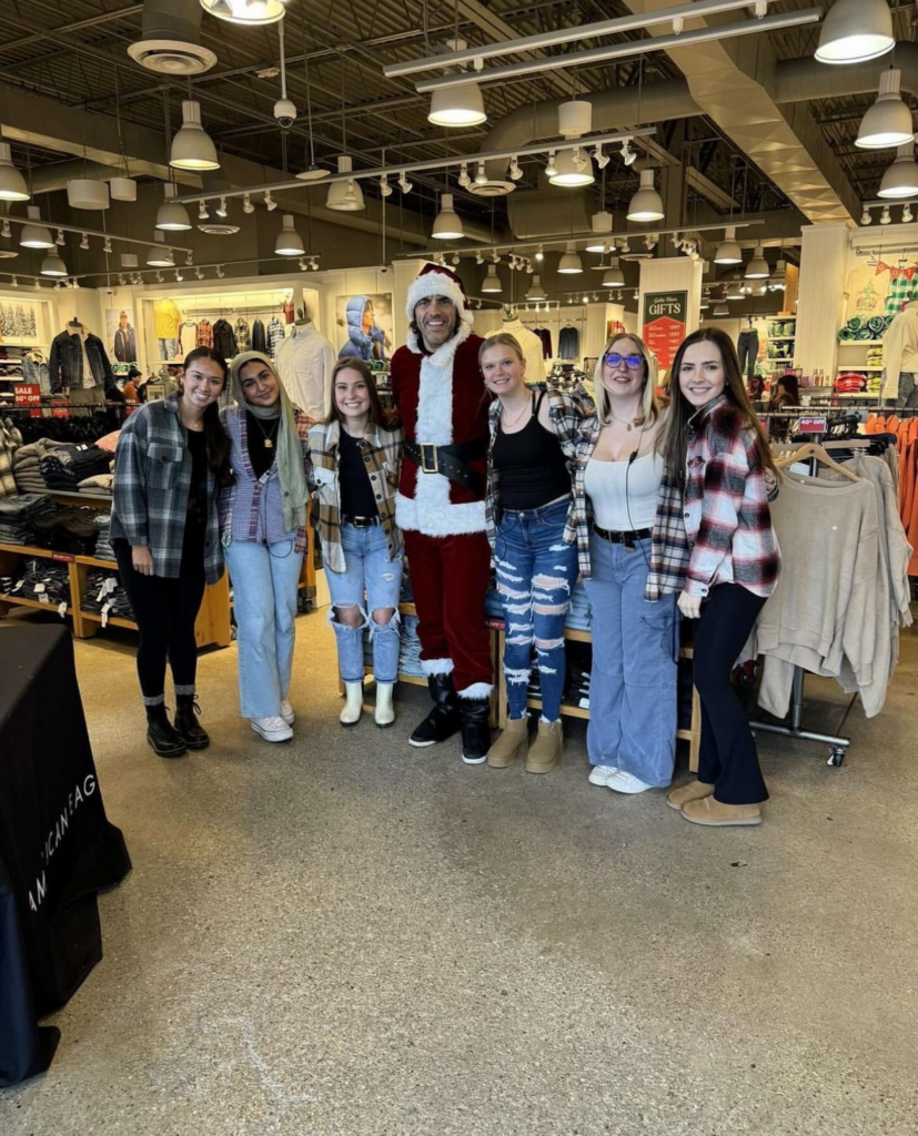 Advantage team in a store with Santa